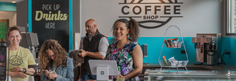 Team Hills volunteers serving in the New Hills coffee shop